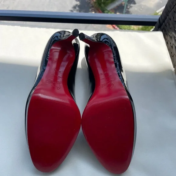 Christian Louboutin in premium leather, these heels feature a classic pump style